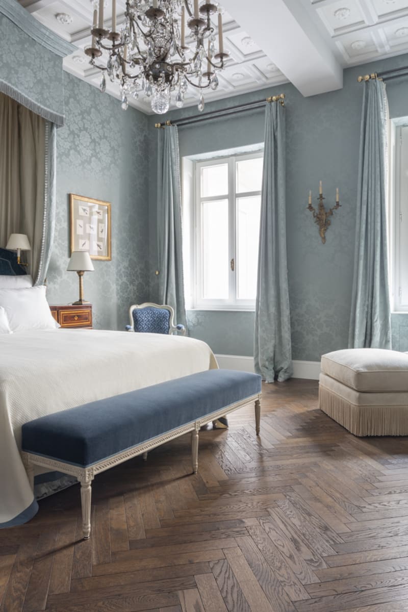 blue walls with dark wood floor